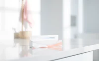 Brighten your smile with a premium teeth whitening kit displayed on a clean countertop.